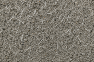 Fiber-reinforced concrete showing distributed fibers