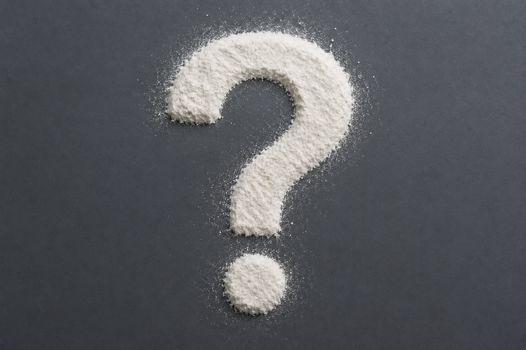 Frequently Asked Questions about CMC A question mark made out of white CMC powder