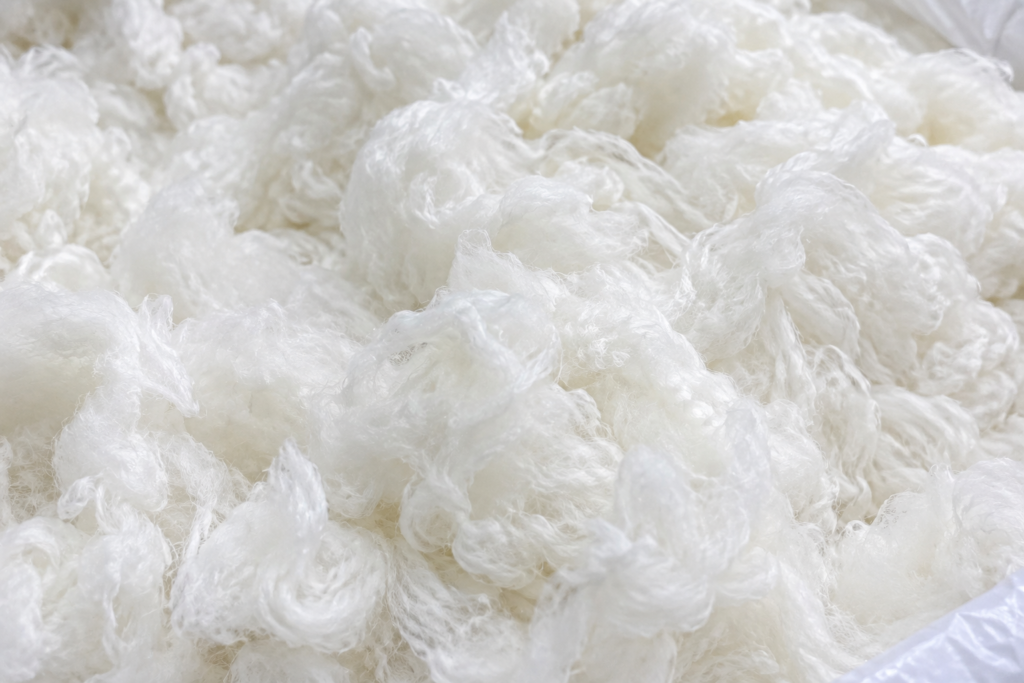 High-Purity Refined Cotton for HPMC Close-up of high-quality, pure white refined cotton fibers.
